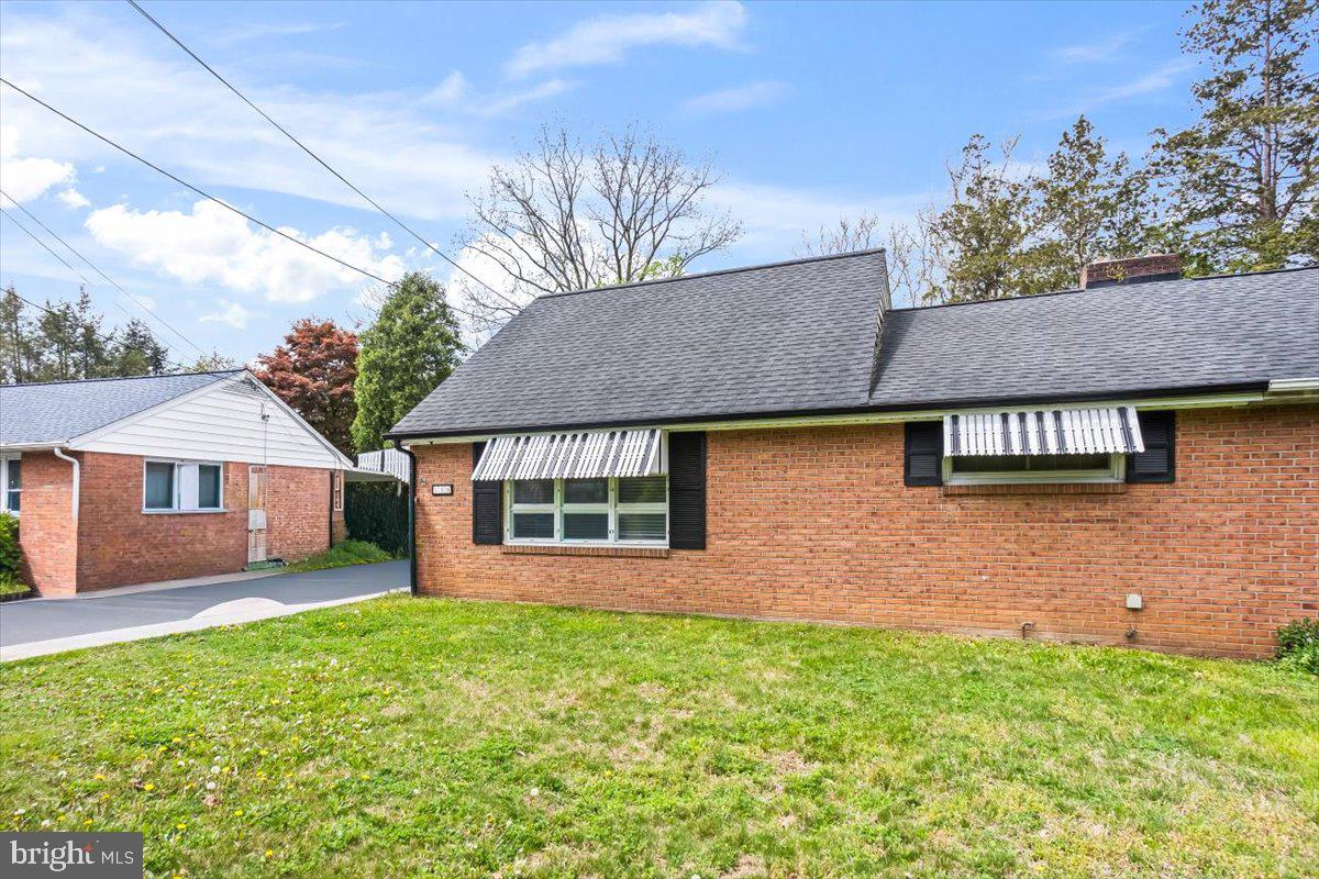 Charming brick home with inviting curb appeal.
