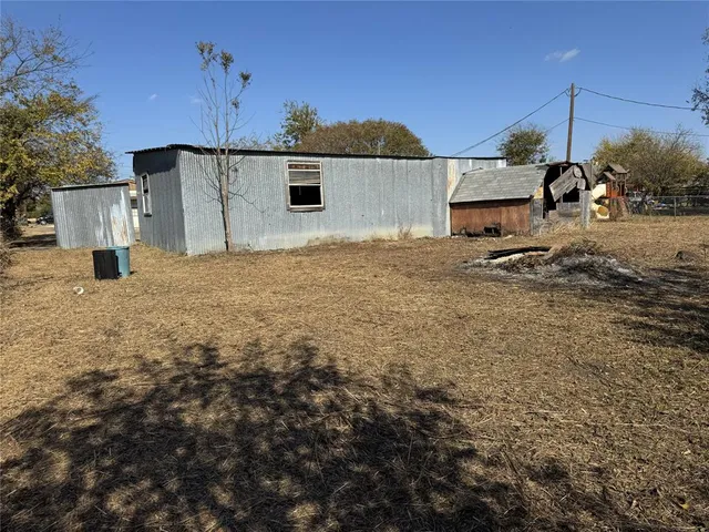 a view of a house with a patio