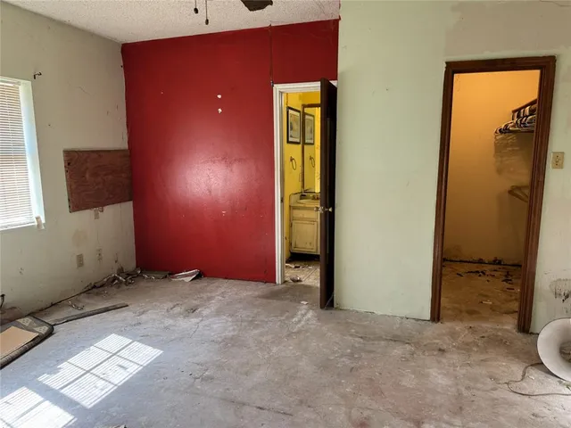 an empty room with windows