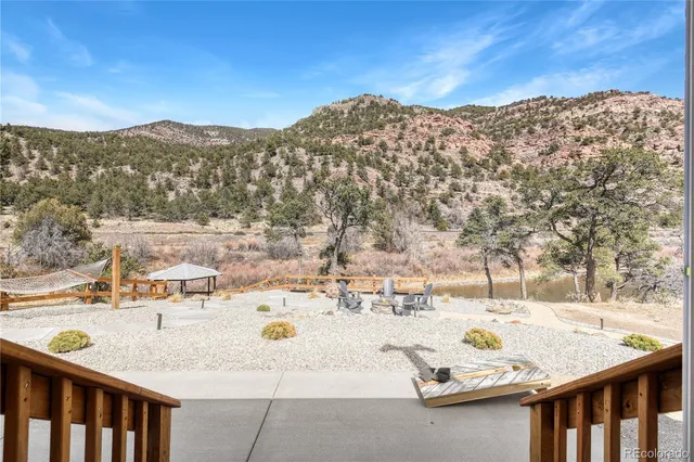 a view of roof with wooden fence