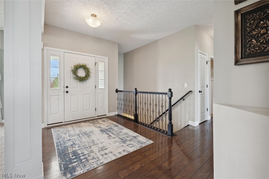 405 East Luchsinger Road Port Clinton, OH 43452 - Photo 40 of 40 open foyer leads into open concept floor plan, high ceilings