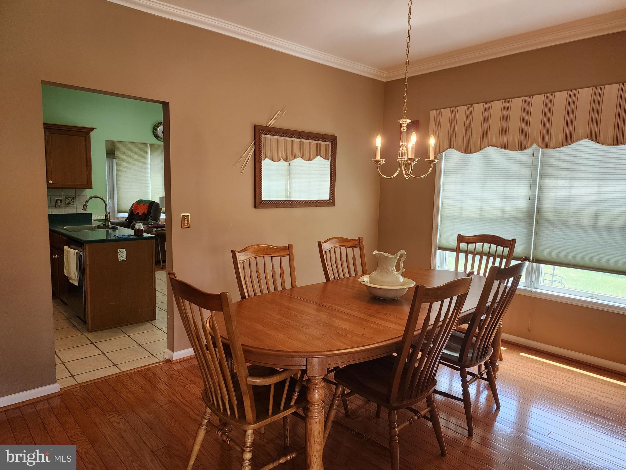 33 Sunset Lane Columbus, NJ 08022 - Photo 8 of 29 a view of a dining room with furniture and wooden floor