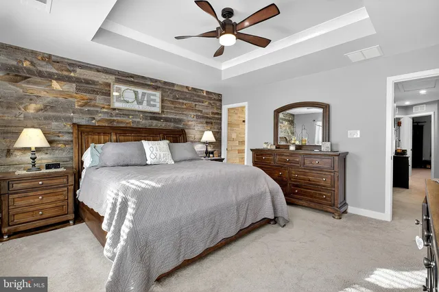 a living room with granite countertop furniture and dresser