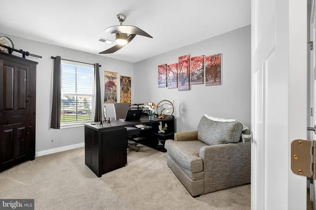an aerial view of a house with a ocean view