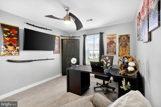 an aerial view of a house with a garden view