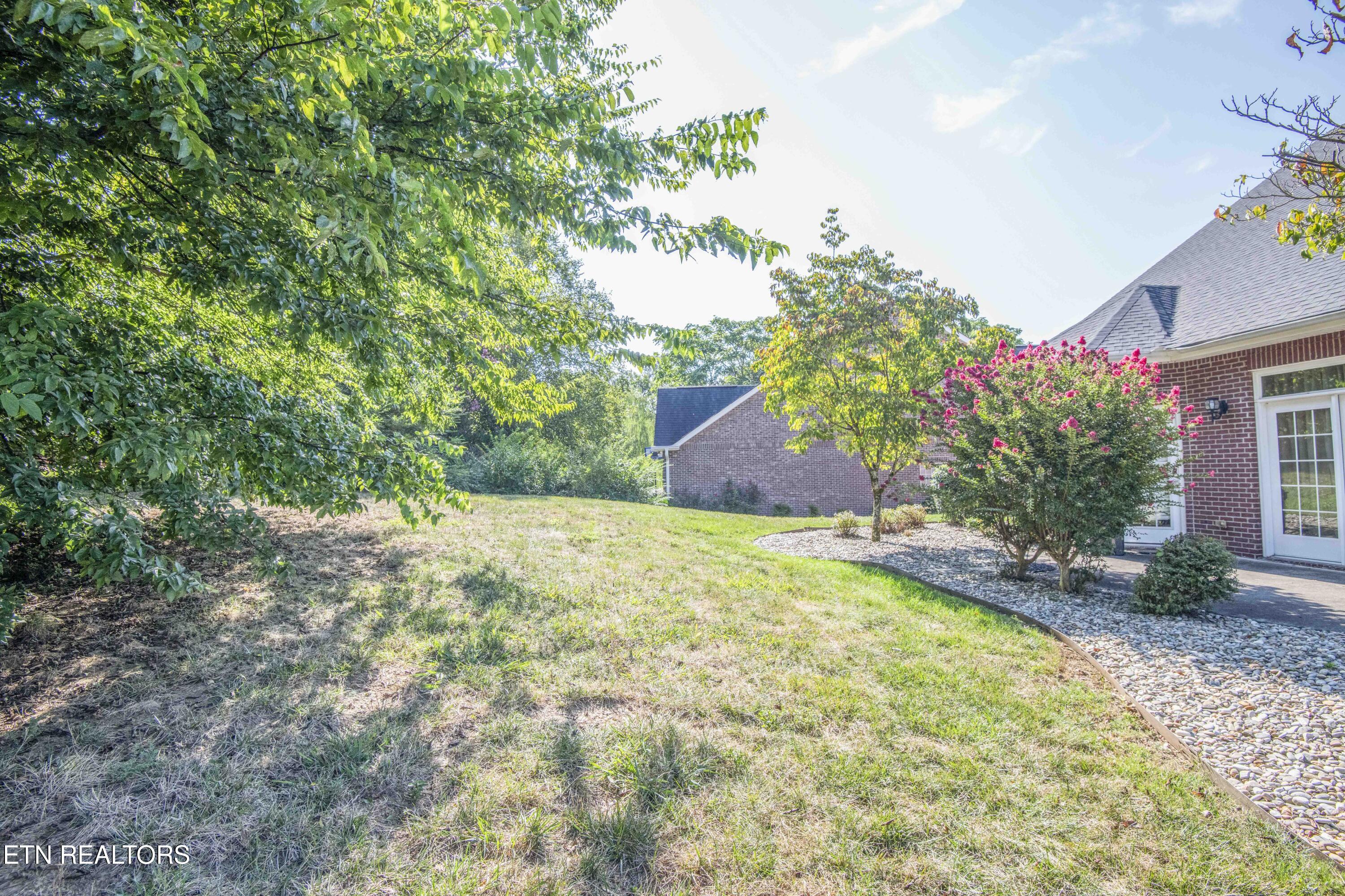 119 Waterston Way Clinton, TN 37716 - Photo 8 of 38 Back patio and yard