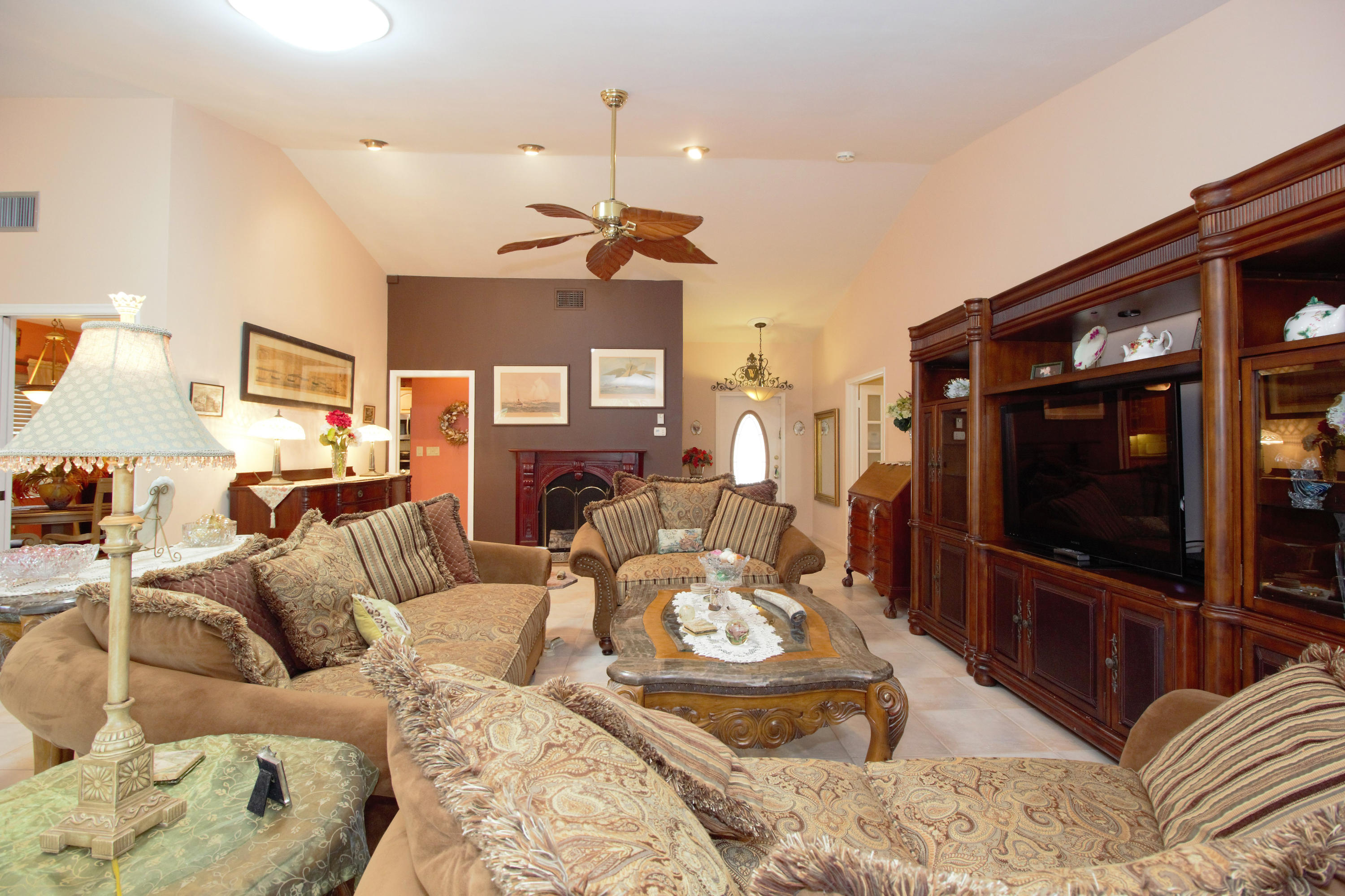 7897 Cloverfield Circle Boca Raton, FL 33433 - Photo 14 of 28 7897 living room near piano