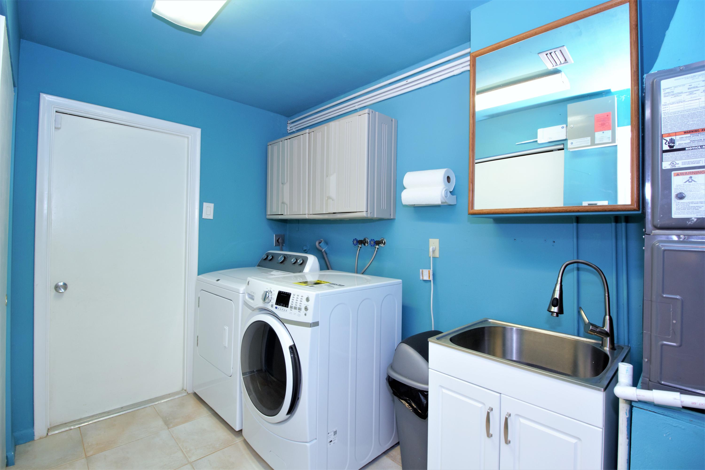 7897 Cloverfield Circle Boca Raton, FL 33433 - Photo 24 of 28 7897 laundry room_pantry