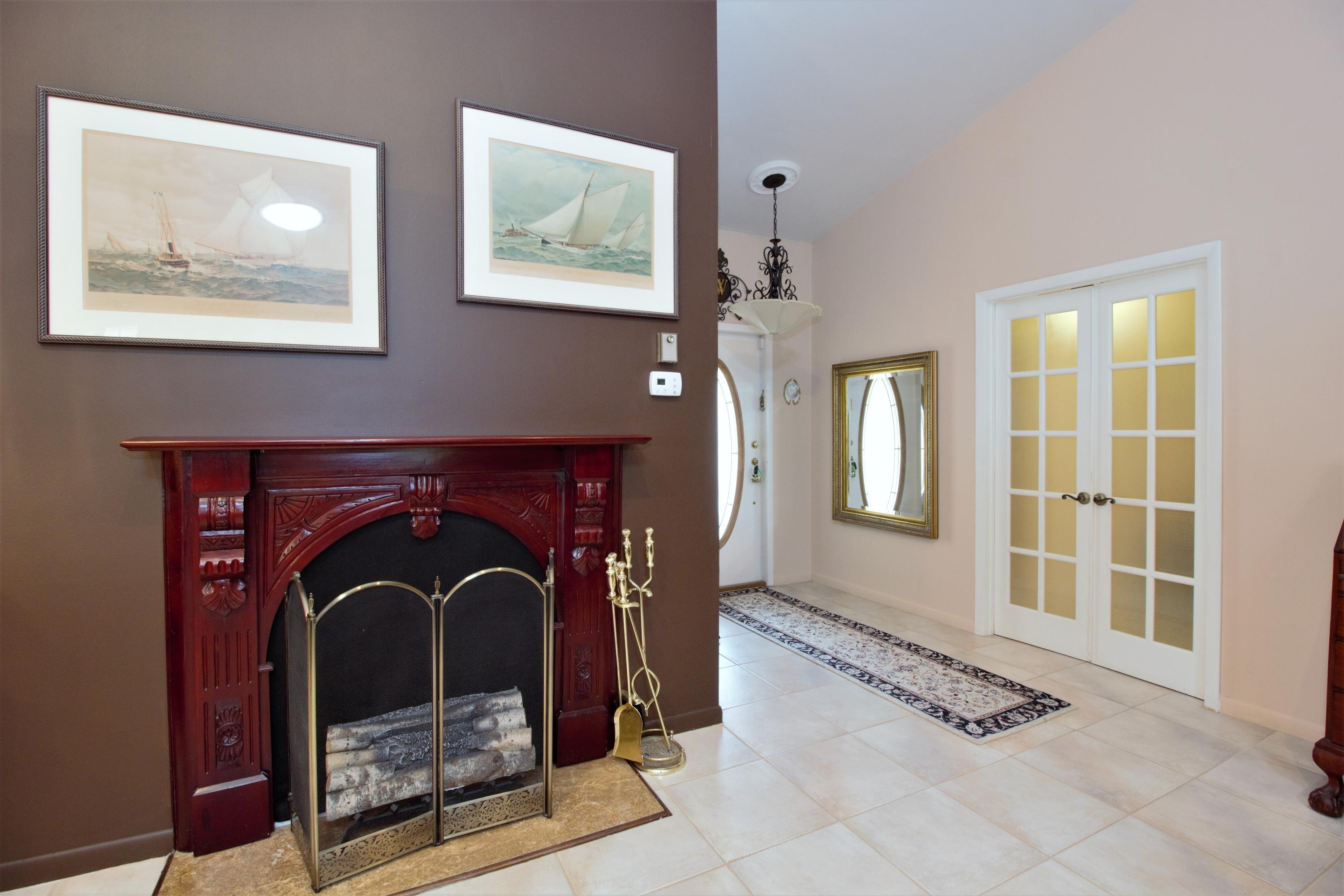 7897 Cloverfield Circle Boca Raton, FL 33433 - Photo 10 of 28 7897 entry_french doors_fireplace (2) (1