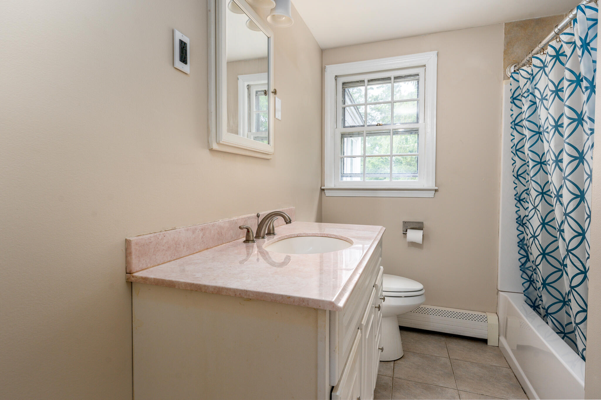 65 Elliott Road Centerville, MA 02632 - Photo 23 of 36 a bathroom with a sink toilet and tub