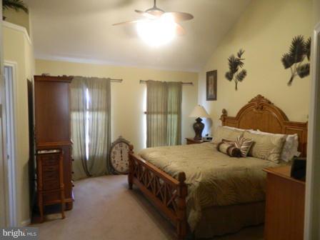 5112 Key View Way Perry Hall, MD 21128 - Photo 6 of 15 a bedroom with a bed and dresser with mirror