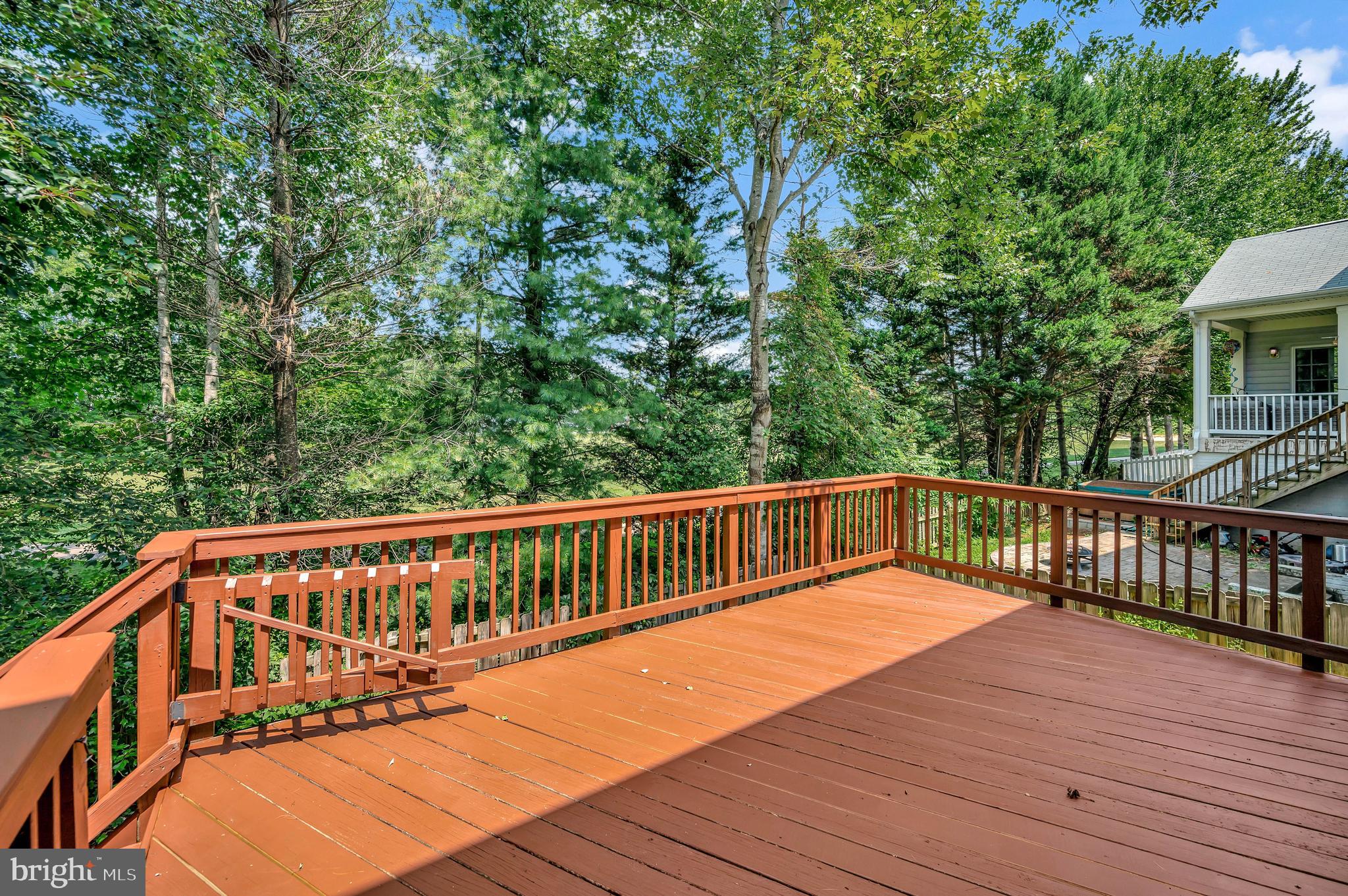 35287 Balmoral Drive Locust Grove, VA 22508 - Photo 38 of 50 Deck with course view and trees for privacy