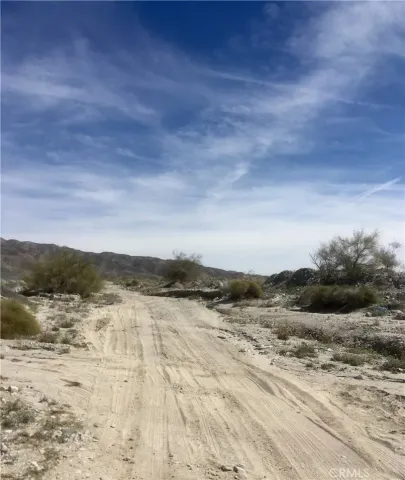 a view of lake with mountain