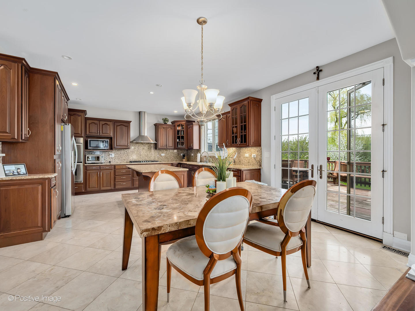 2804 Central Road Glenview, IL 60025 - Photo 12 of 41 a dining room filled with furniture and a chandelier