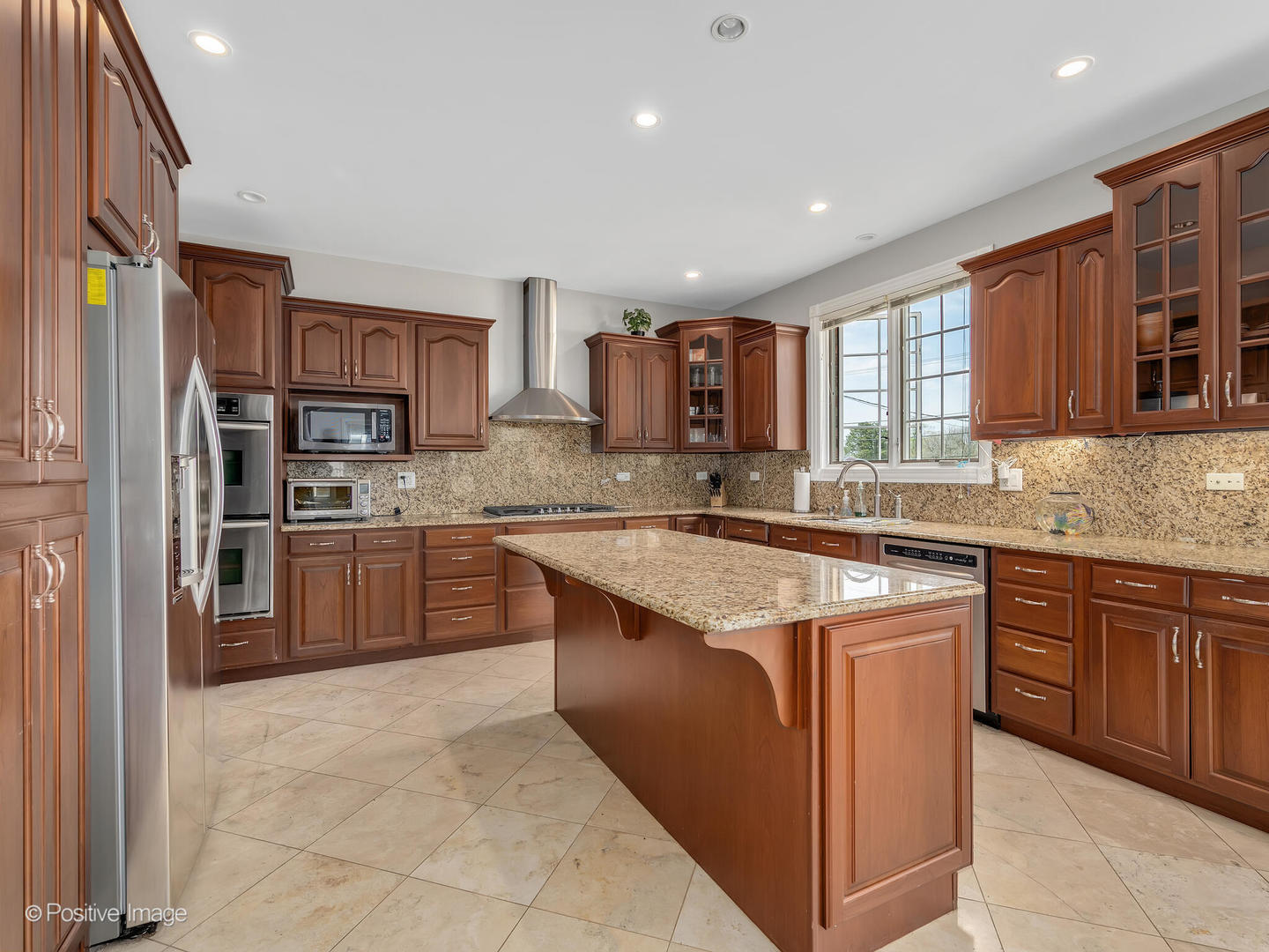2804 Central Road Glenview, IL 60025 - Photo 14 of 41 a kitchen with stainless steel appliances granite countertop a stove sink and cabinets