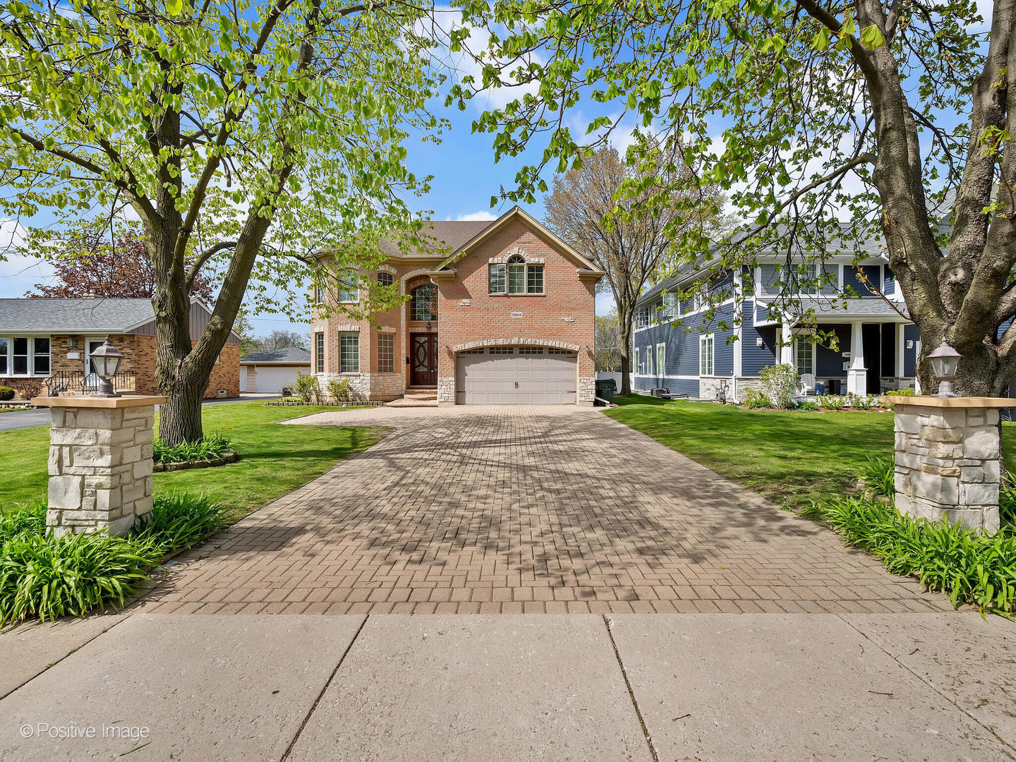 2804 Central Road Glenview, IL 60025 - Photo 5 of 41 a front view of a house with a yard and trees