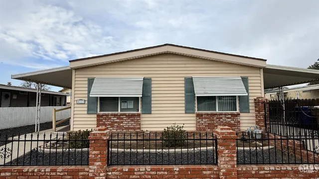 a front view of a house with balcony