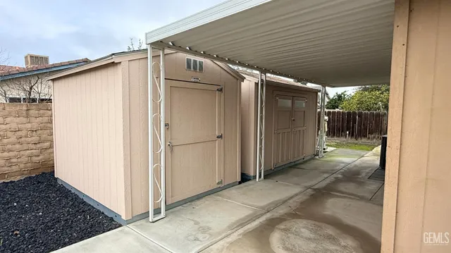 a view of a back yard of the house