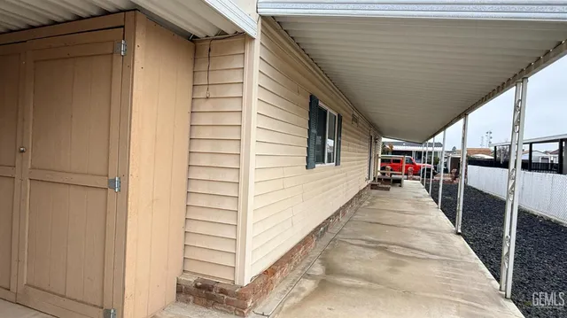 a view of a balcony with door