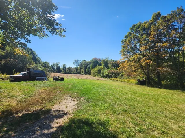 a view of backyard with outdoor space