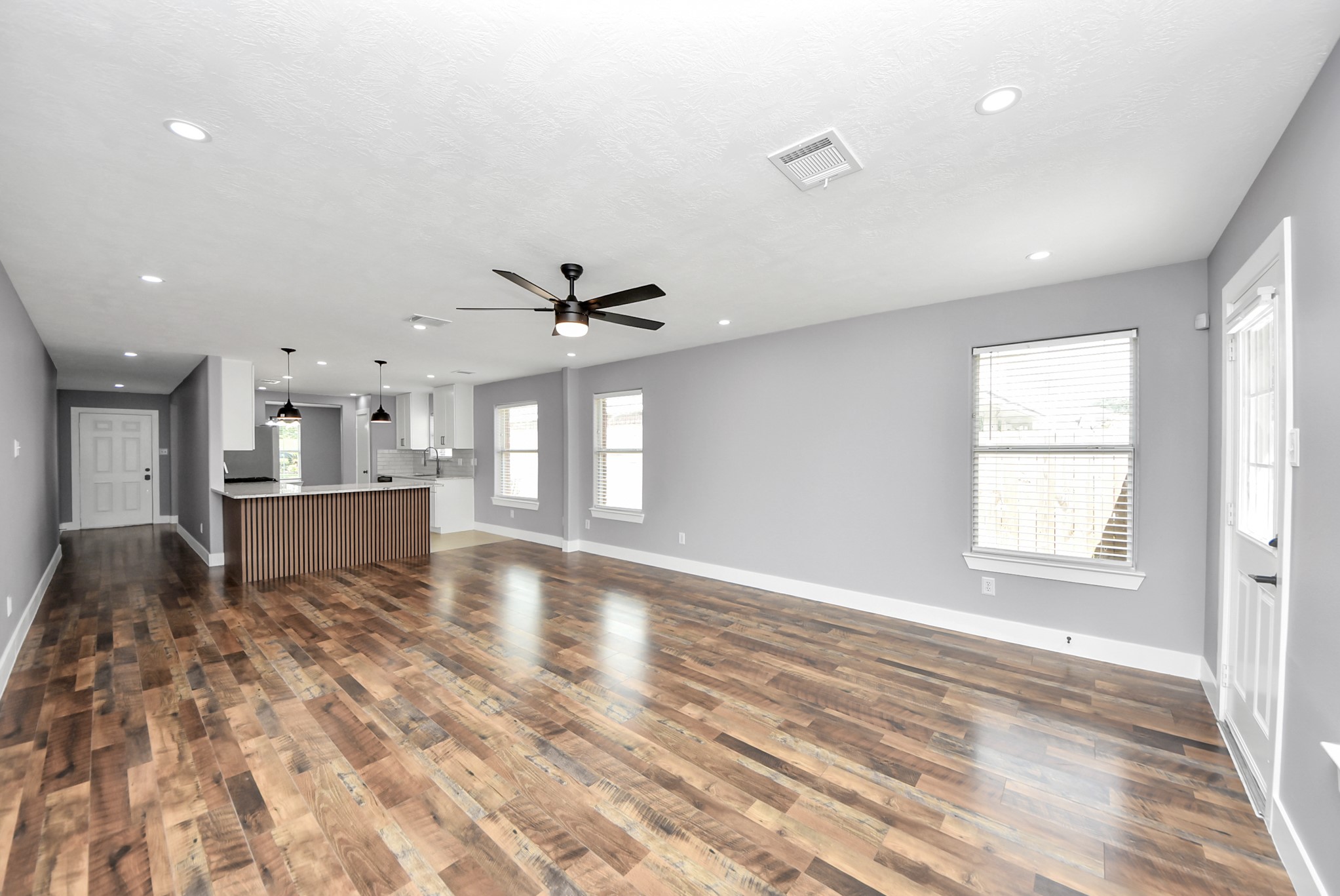 24027 Pinecreek Point Spring, TX 77373 - Photo 18 of 41 Living Room Open to Kitchen