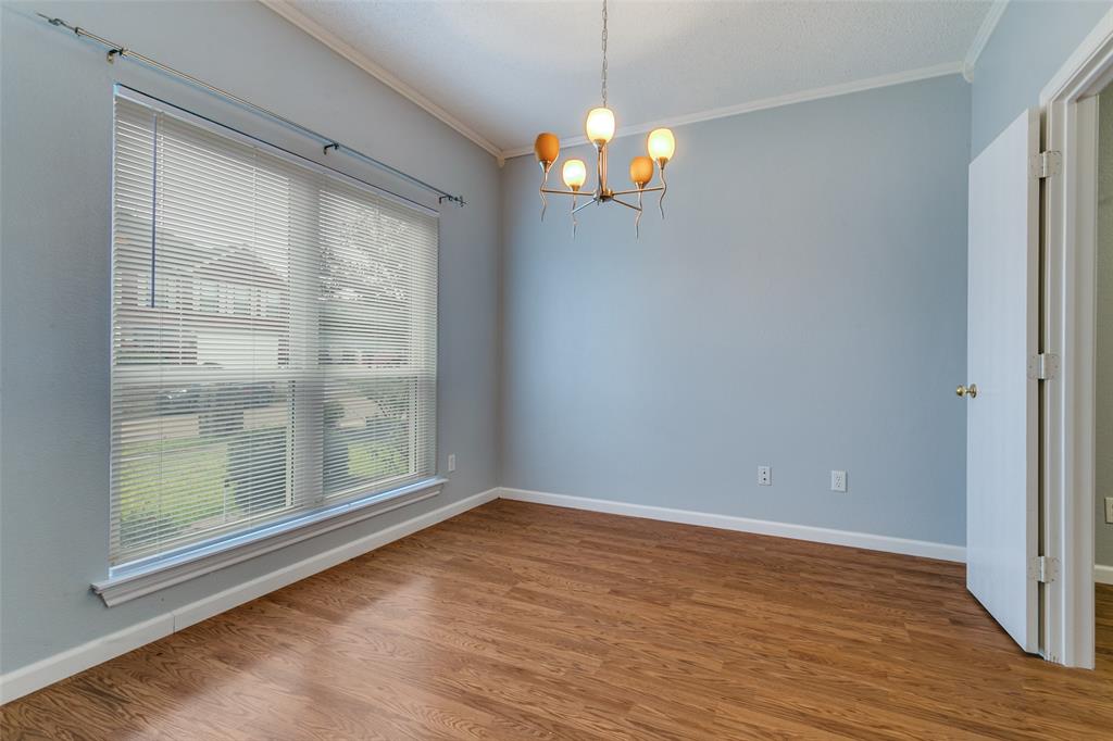 307 Pointer Place Arlington, TX 76002 - Photo 5 of 25 a view of empty room with wooden floor and fan