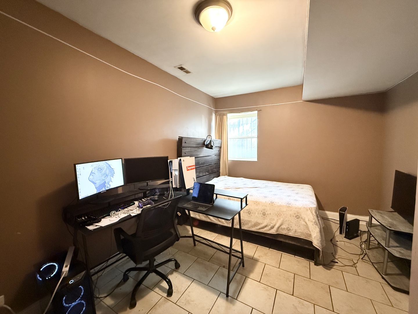 6035 South St Lawrence Avenue, Unit GS Chicago, IL 60637 - Photo 16 of 17 a bedroom with a bed and a desk