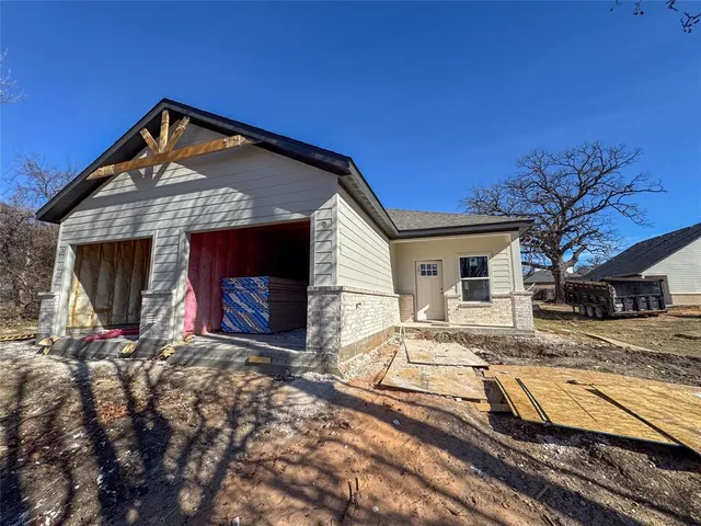 a view of a house with a patio