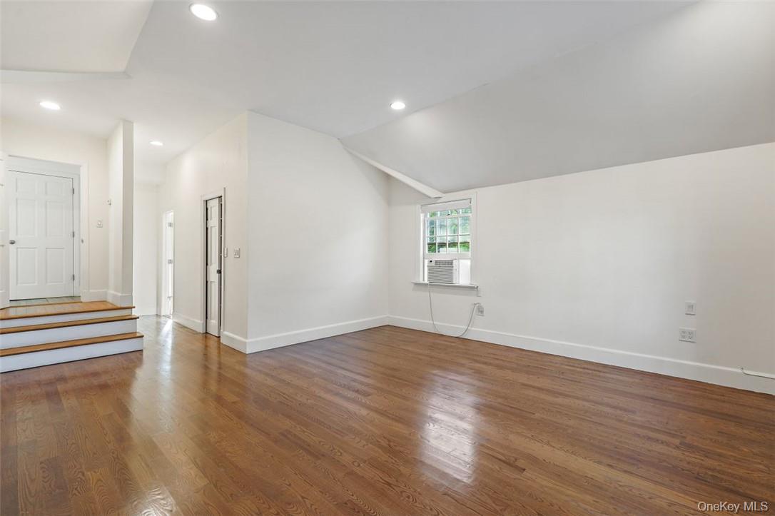 246 Mamaroneck Road Scarsdale, NY 10583 - Photo 28 of 35 Primary bedroom with high ceilings and beautiful hardwood floors