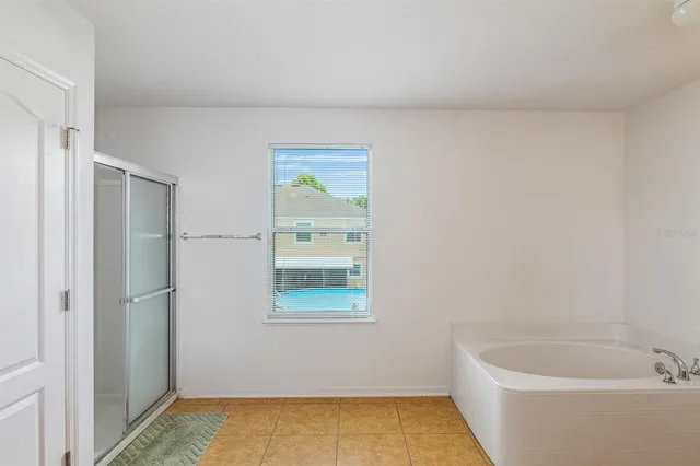 a bathroom with a sink vanity and mirror