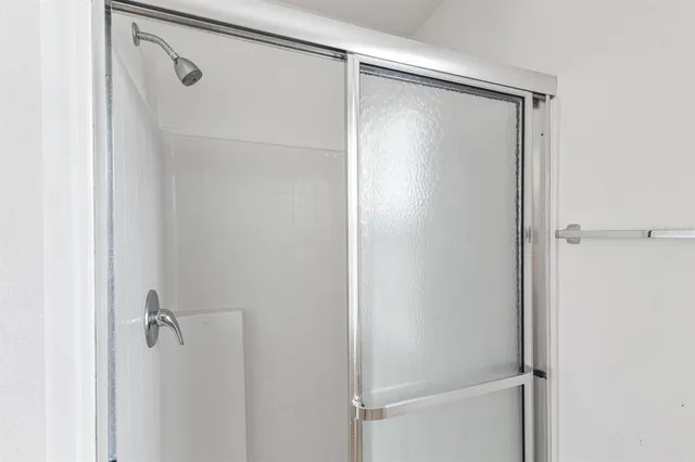 a white bath tub sitting in a bathroom