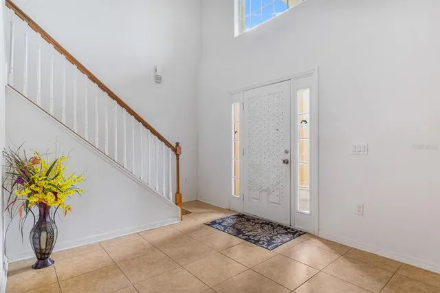 a bathroom with a sink a mirror and a shower