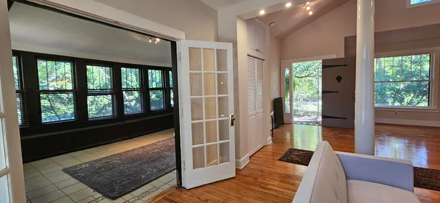 a view of a bathroom from a hallway