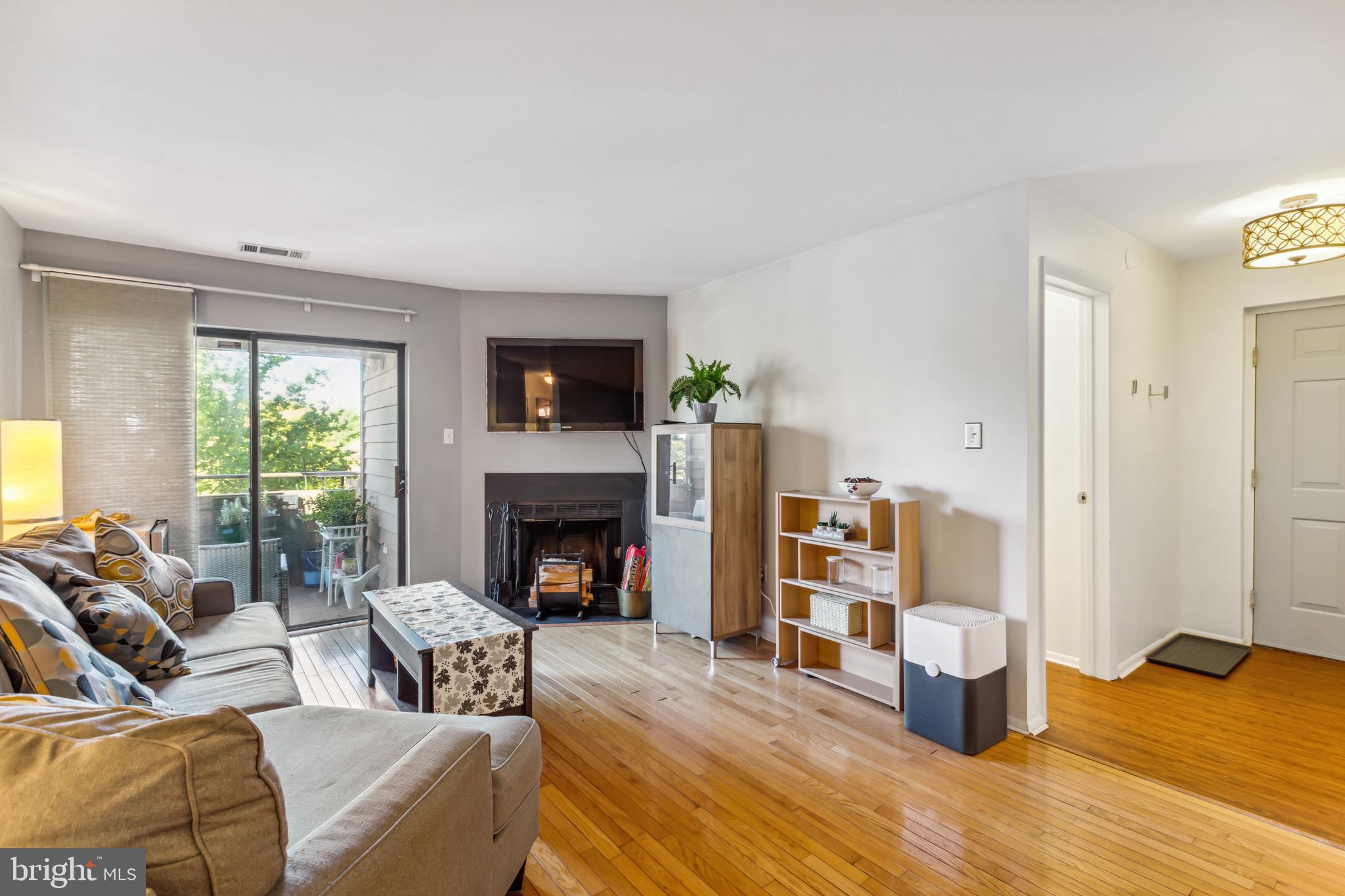 5355 Smooth Meadow Way, Unit 5 Columbia, MD 21044 - Photo 6 of 30 Living Room w/ Balcony Access
