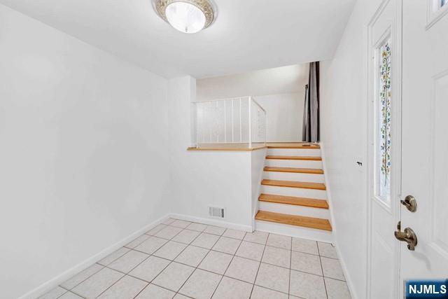 516 Knickerbocker Road Cresskill, NJ 07626 - Photo 3 of 31 a view of a closet area with staircase