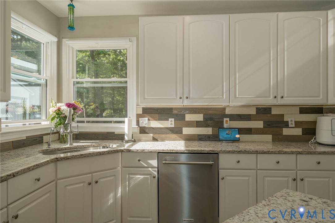 12700 Coalboro Road Chesterfield, VA 23838 - Photo 13 of 50 Kitchen featuring white cabinetry, granite counter