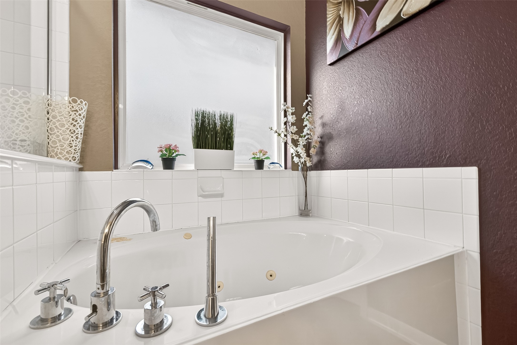 16715 Mackenzie Mesa Drive Spring, TX 77379 - Photo 40 of 50 a bath tub sitting next to a bathroom sink