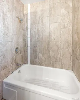 a bathroom with a bathtub