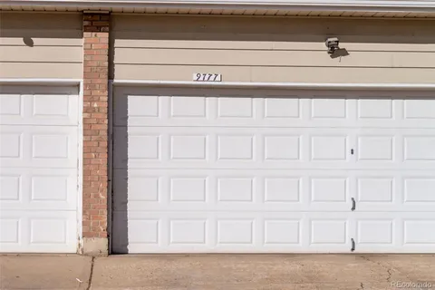 a front view of a building with street view