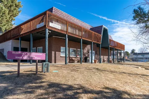 front view of a house with a patio