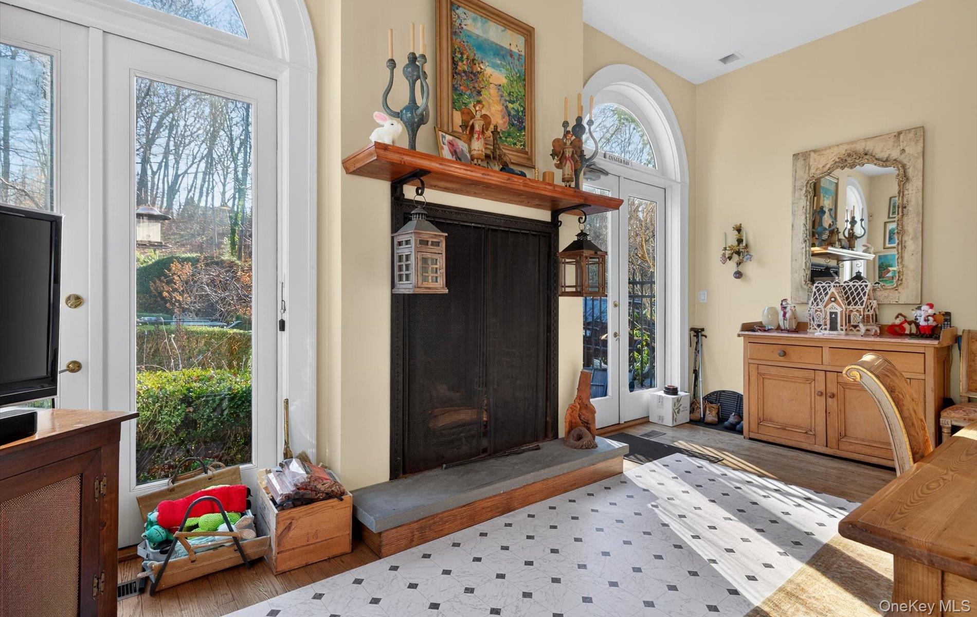 38 Tiffany Road Oyster Bay, NY 11771 - Photo 27 of 50 Rumford fireplace ,wood finished floors, french doors