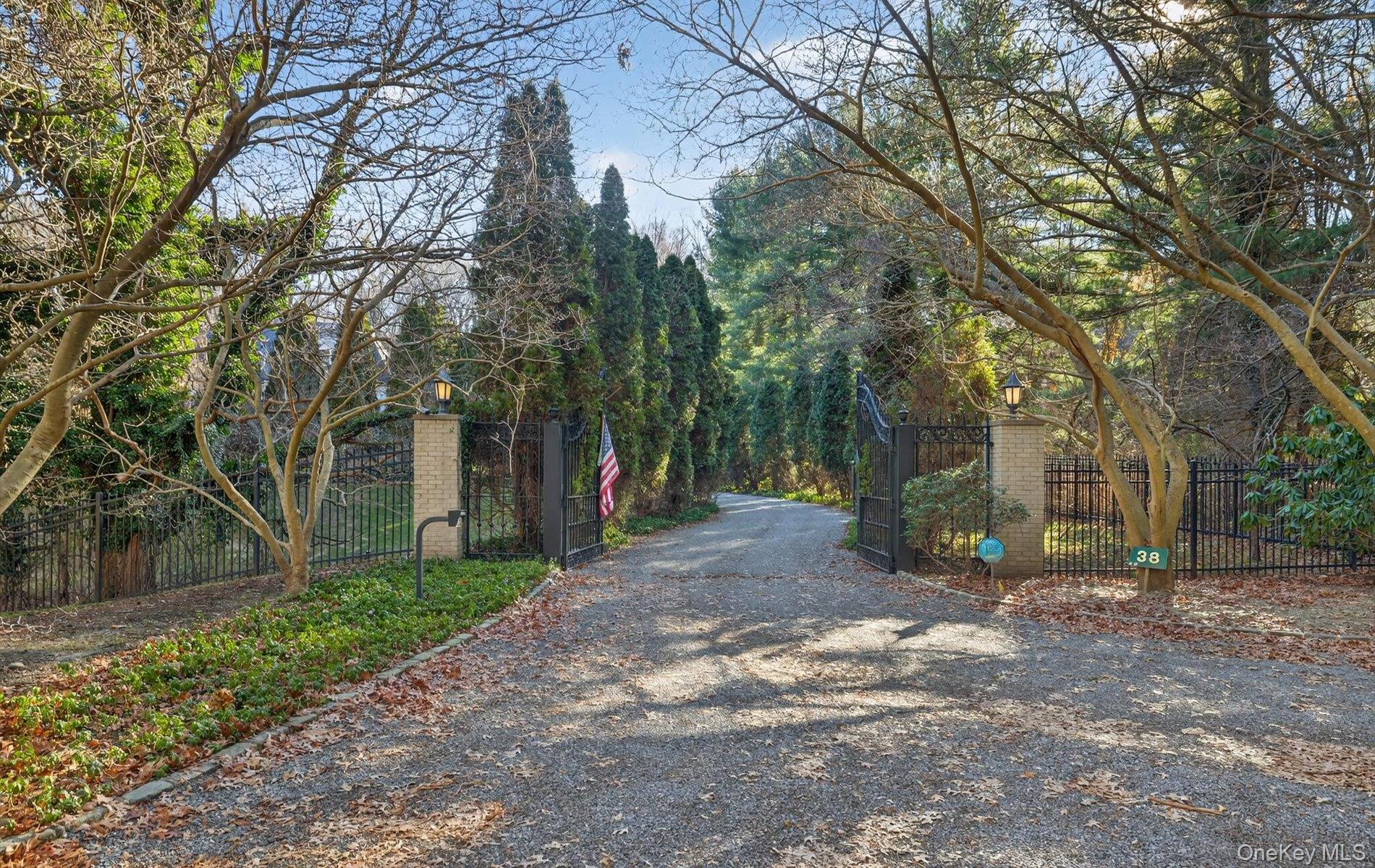 38 Tiffany Road Oyster Bay, NY 11771 - Photo 6 of 50 View of entryway featuring a Estate fence gated entry