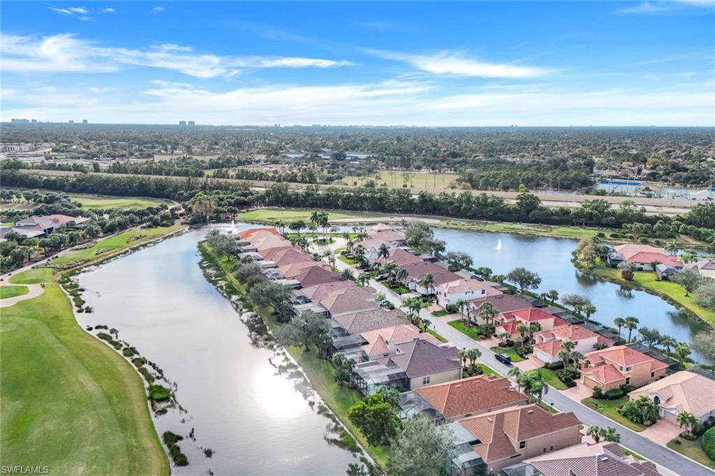 17896 Modena Road Miromar Lakes, FL 33913 - Photo 34 of 38 Drone / aerial view featuring a water view