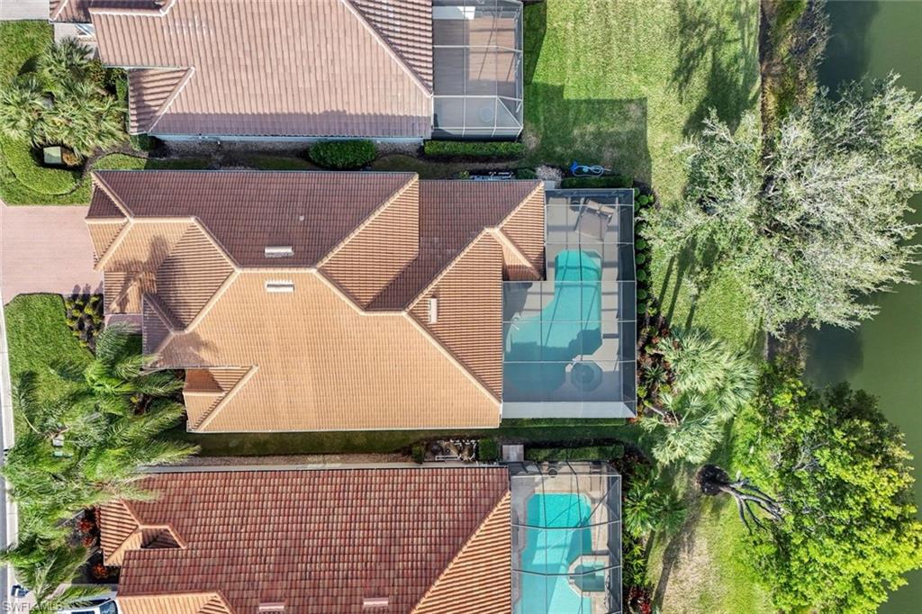 17896 Modena Road Miromar Lakes, FL 33913 - Photo 35 of 38 Drone / aerial view with a water view