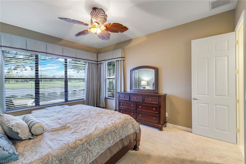 17896 Modena Road Miromar Lakes, FL 33913 - Photo 6 of 38 Furnished Master Bedroom with pool, golf and water view