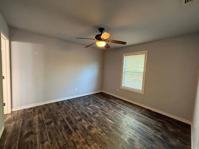 a view of an empty room with window