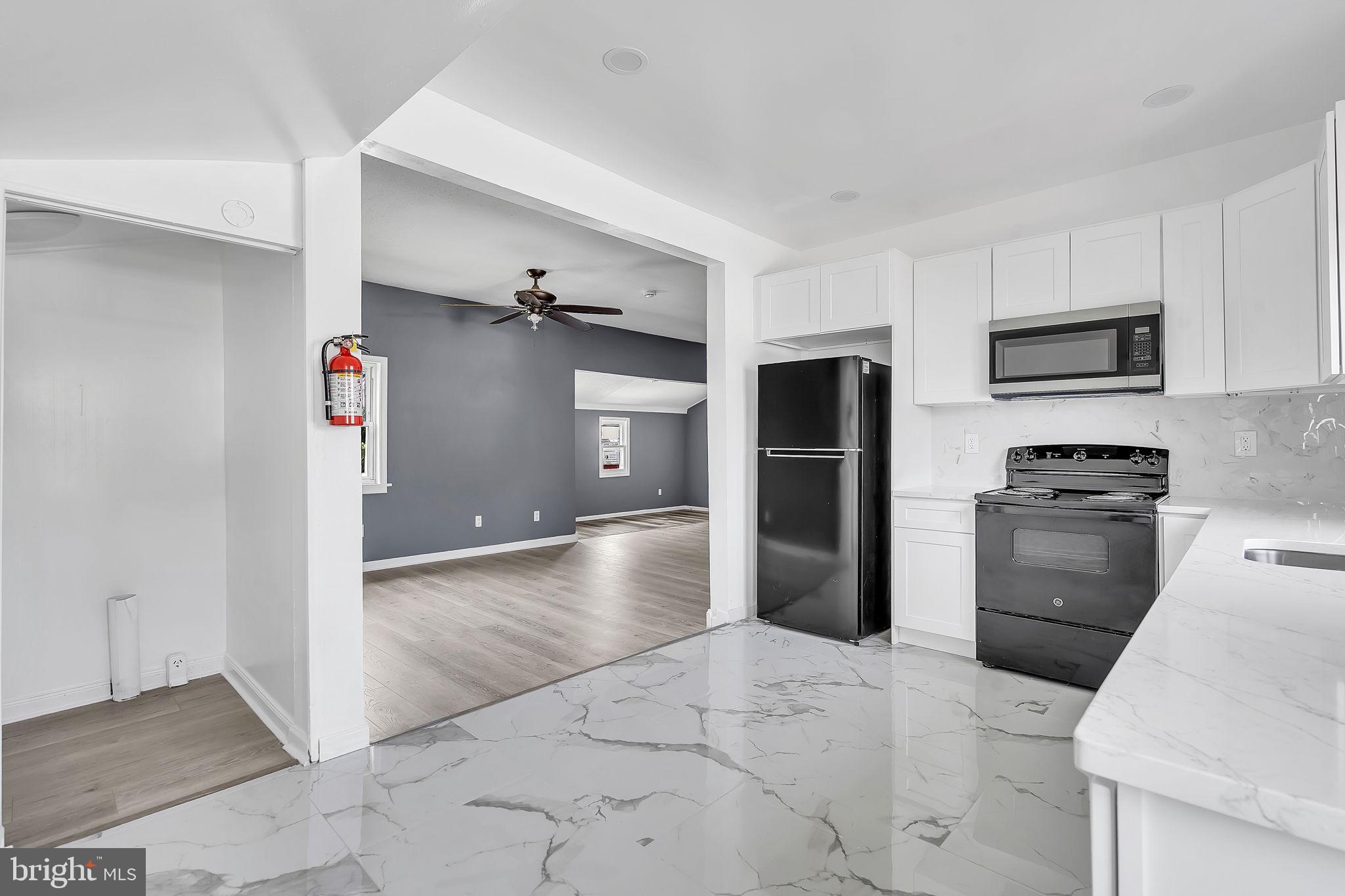 264 Birch Street Carneys Point, NJ 08069 - Photo 9 of 29 Modern kitchen with open layout charm.