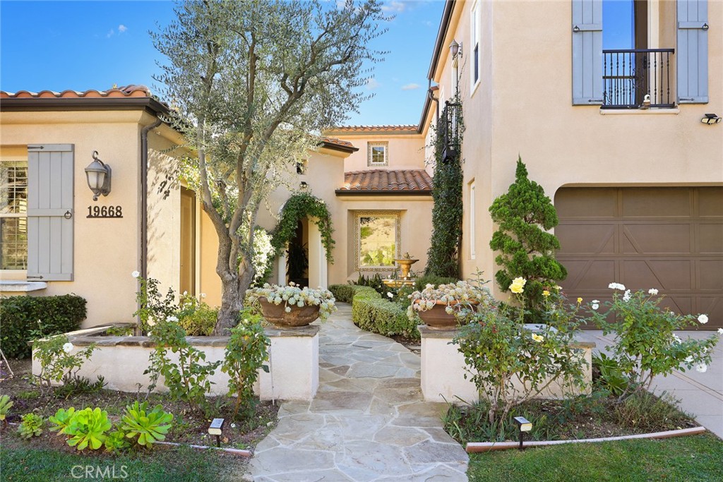 19668 Three Oaks Lane Walnut, CA 91789 - Photo 3 of 45 a front view of a house with a yard