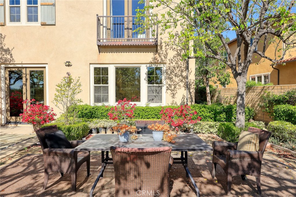 19668 Three Oaks Lane Walnut, CA 91789 - Photo 37 of 45 a view of a dining table and chairs in the patio of the house