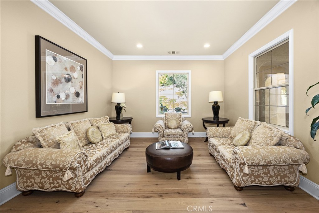 19668 Three Oaks Lane Walnut, CA 91789 - Photo 8 of 45 a living room with furniture and a large window